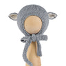 Sheep Bonnet in Charcoal, a knitted cotton bonnet with ecru-lined ears and knitted ties, shown on a wooden display head.